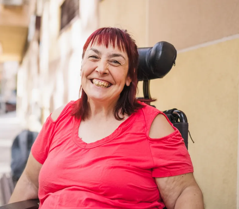 Disabled woman smiling at camera